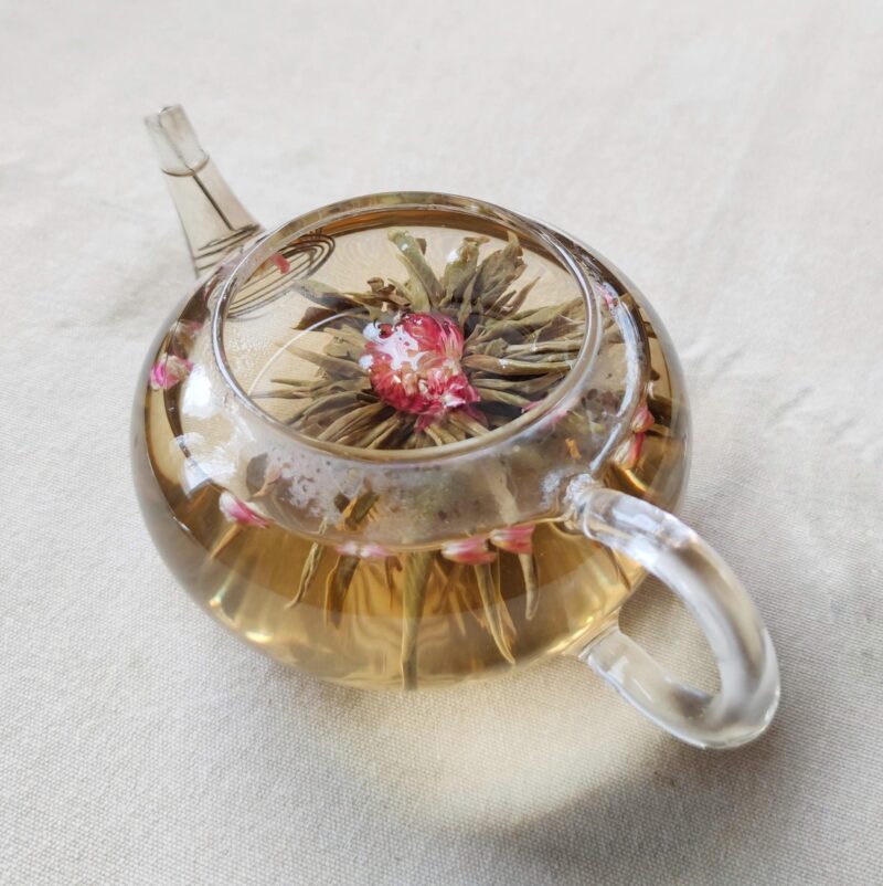 zielona herbata liczi kulka kwiat rozwijający się